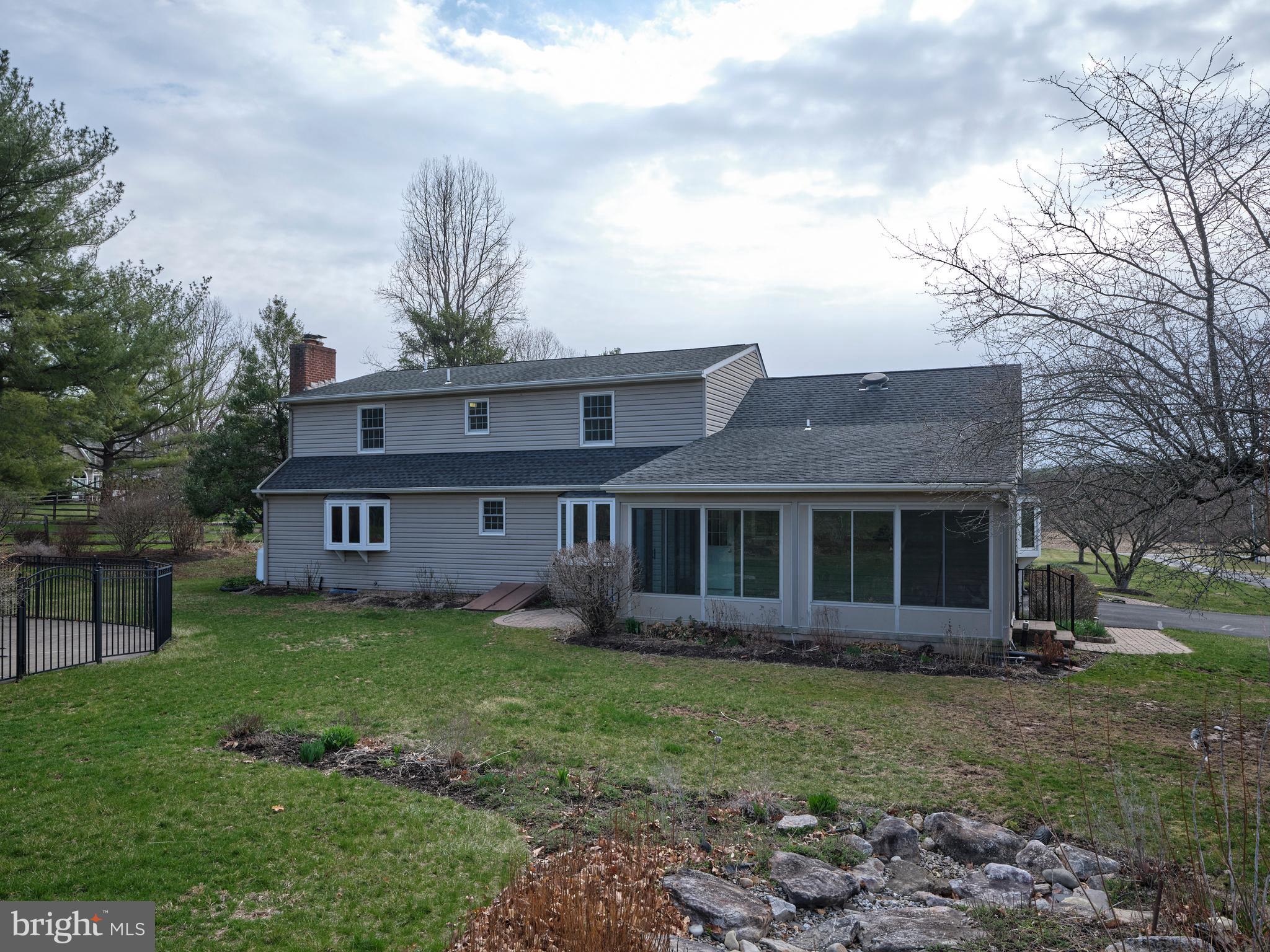 4902 Anderson Road Doylestown, PA 18902 - Photo 41 of 46 a front view of a house with a garden