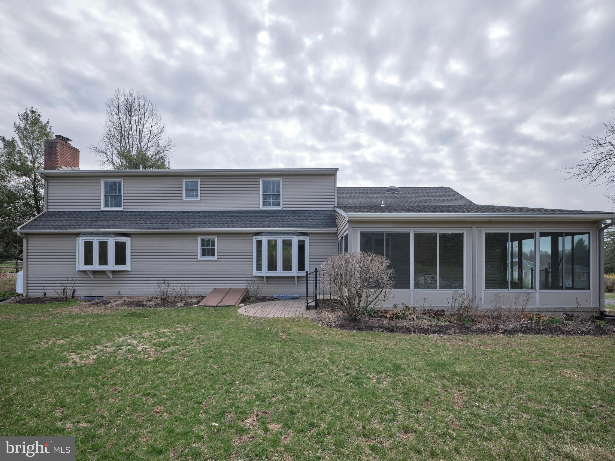 4902 Anderson Road Doylestown, PA 18902 - Photo 45 of 46 a front view of house with yard and green space