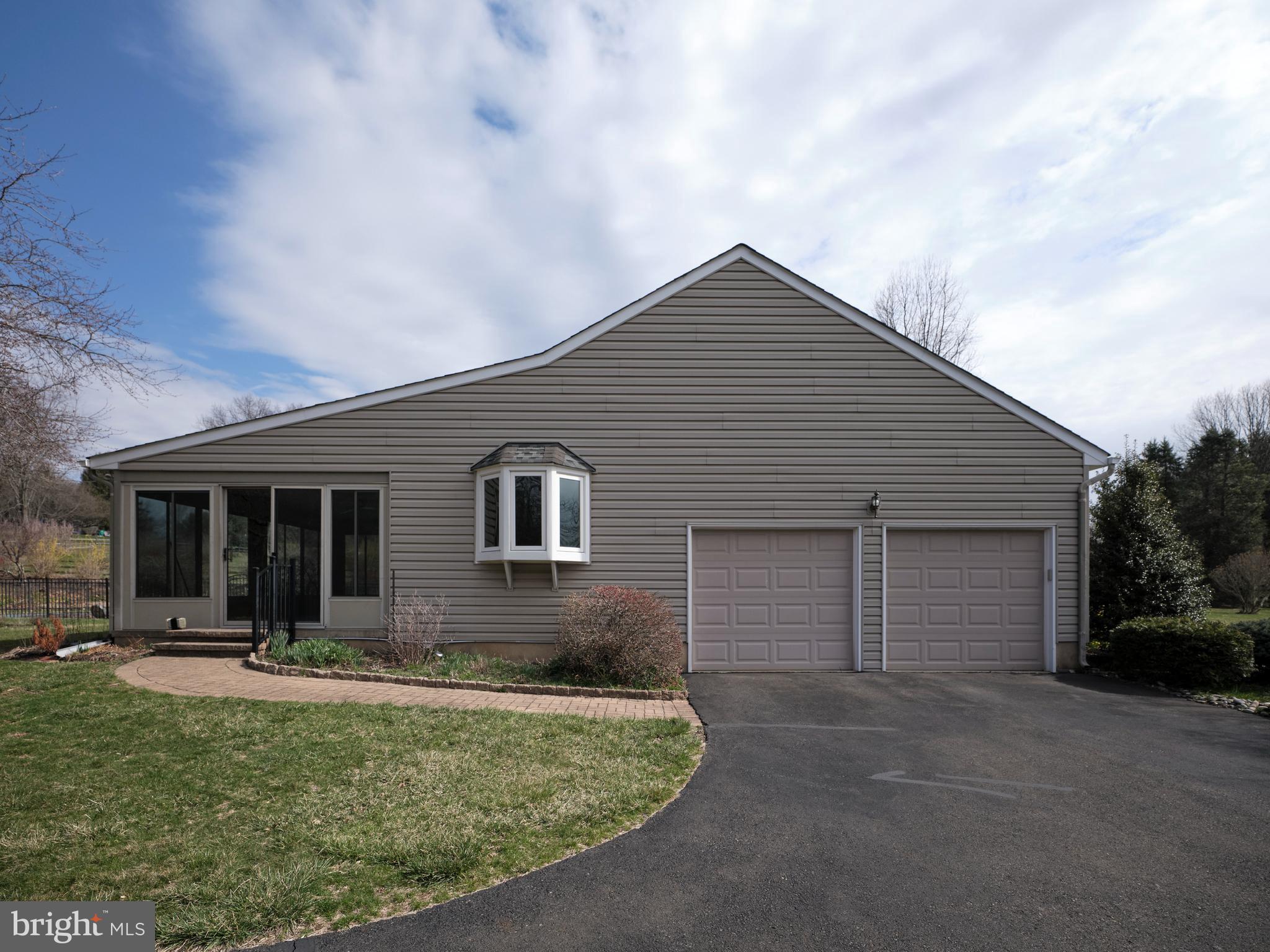4902 Anderson Road Doylestown, PA 18902 - Photo 6 of 46 a view of a house with backyard and porch