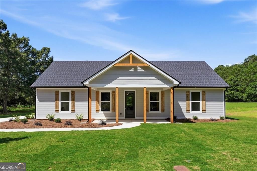 160 Loyd Road Mansfield, GA 30056 - Photo 1 of 52 a front view of a house with a yard