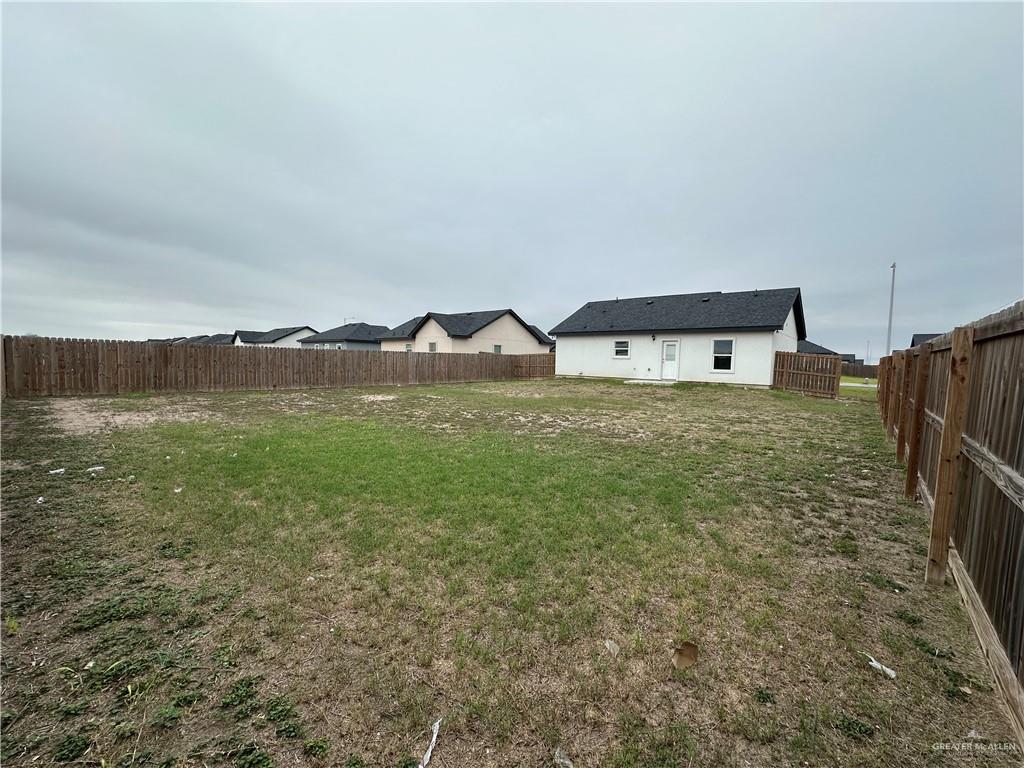 1802 Unity Drive Mercedes, TX 78570 - Photo 11 of 11 a view of a room with table & chairs