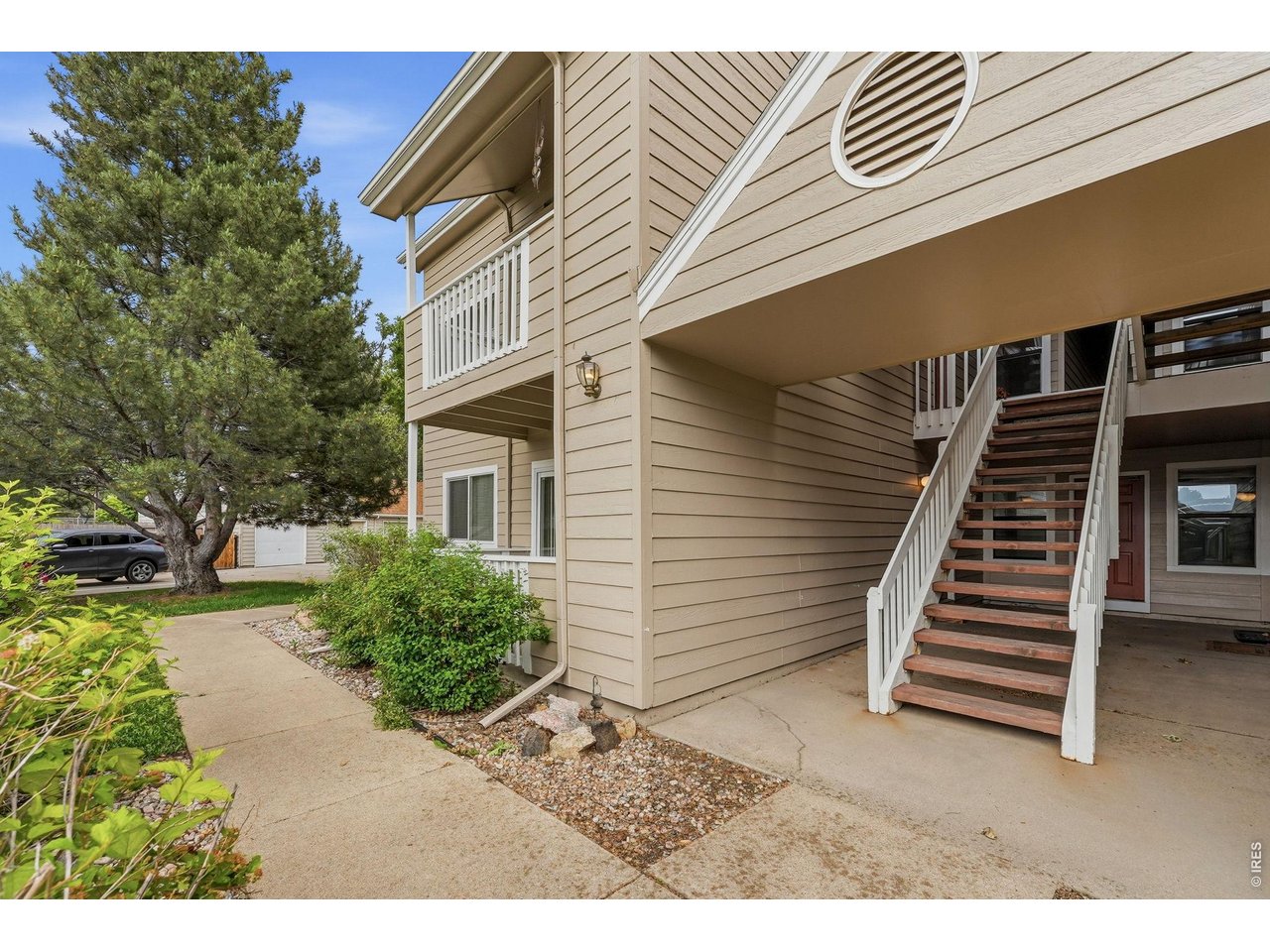 4985 Twin Lakes Road, Unit 94 Boulder, CO 80301 - Photo 20 of 29 This sidewalk from the parking space leads to the stairs to the second floor.