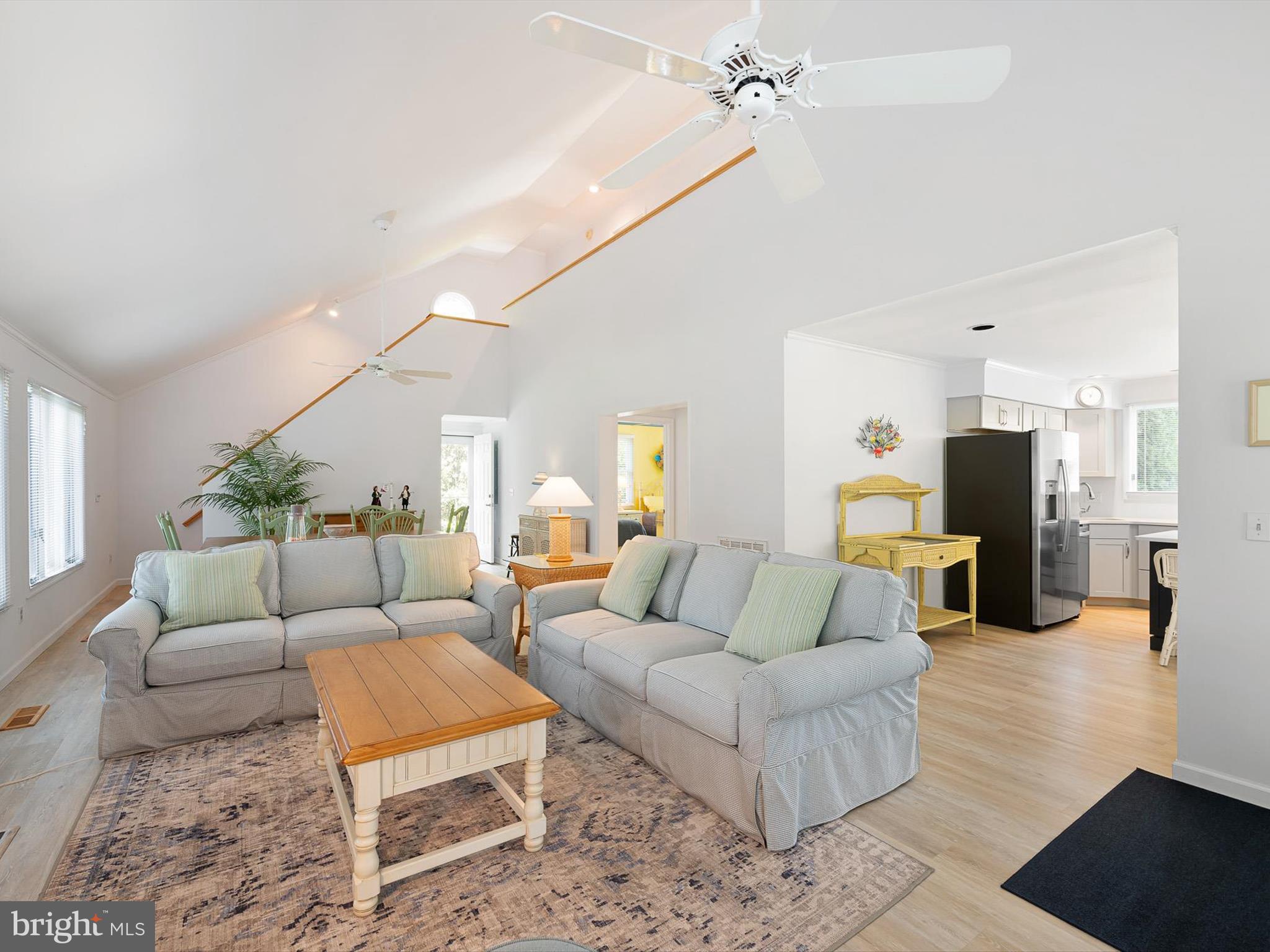 532 Bethany Loop Bethany Beach, DE 19930 - Photo 16 of 65 a living room with furniture and wooden floor