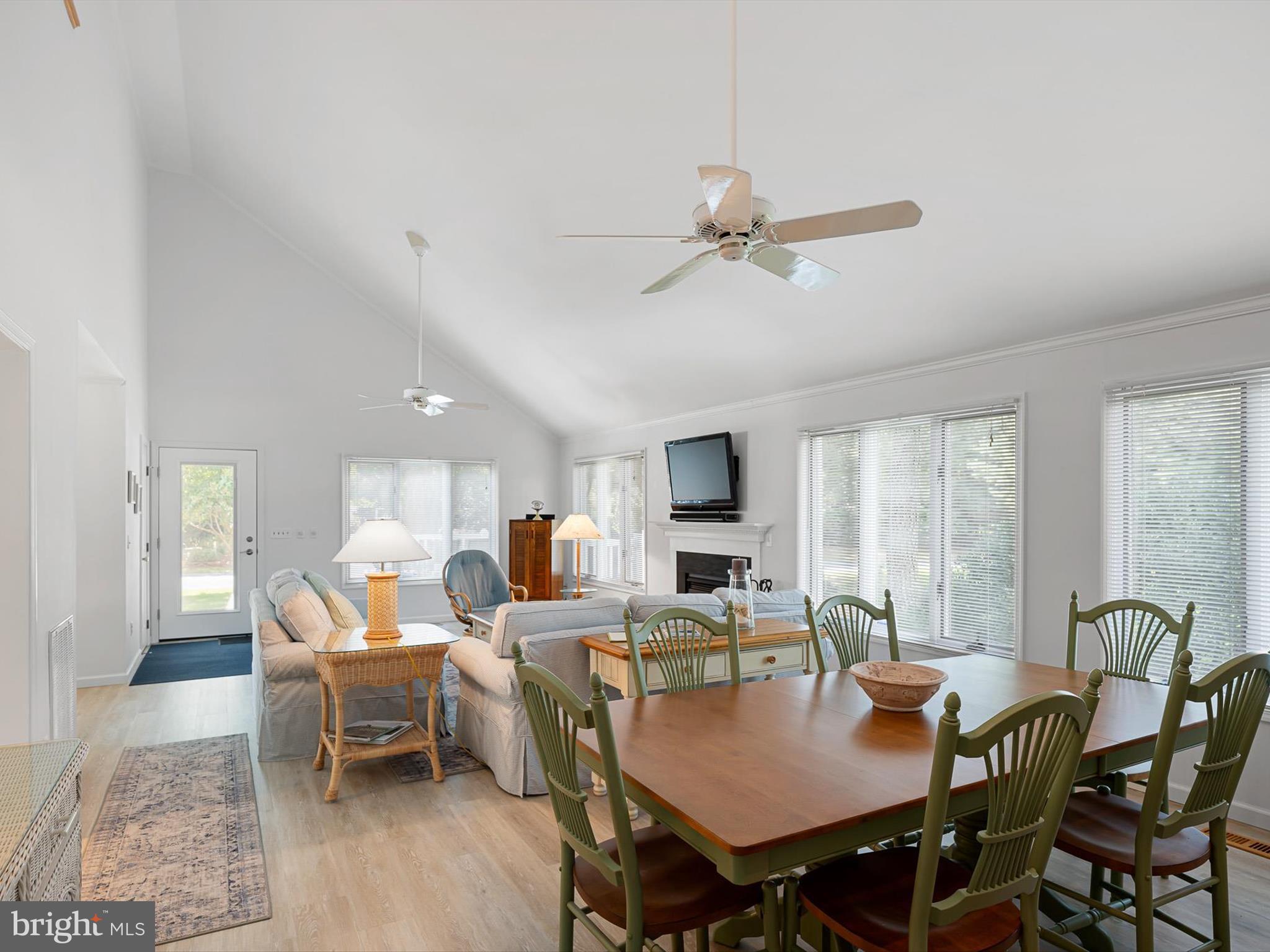 532 Bethany Loop Bethany Beach, DE 19930 - Photo 17 of 65 a view of a dining room with furniture window and outside view
