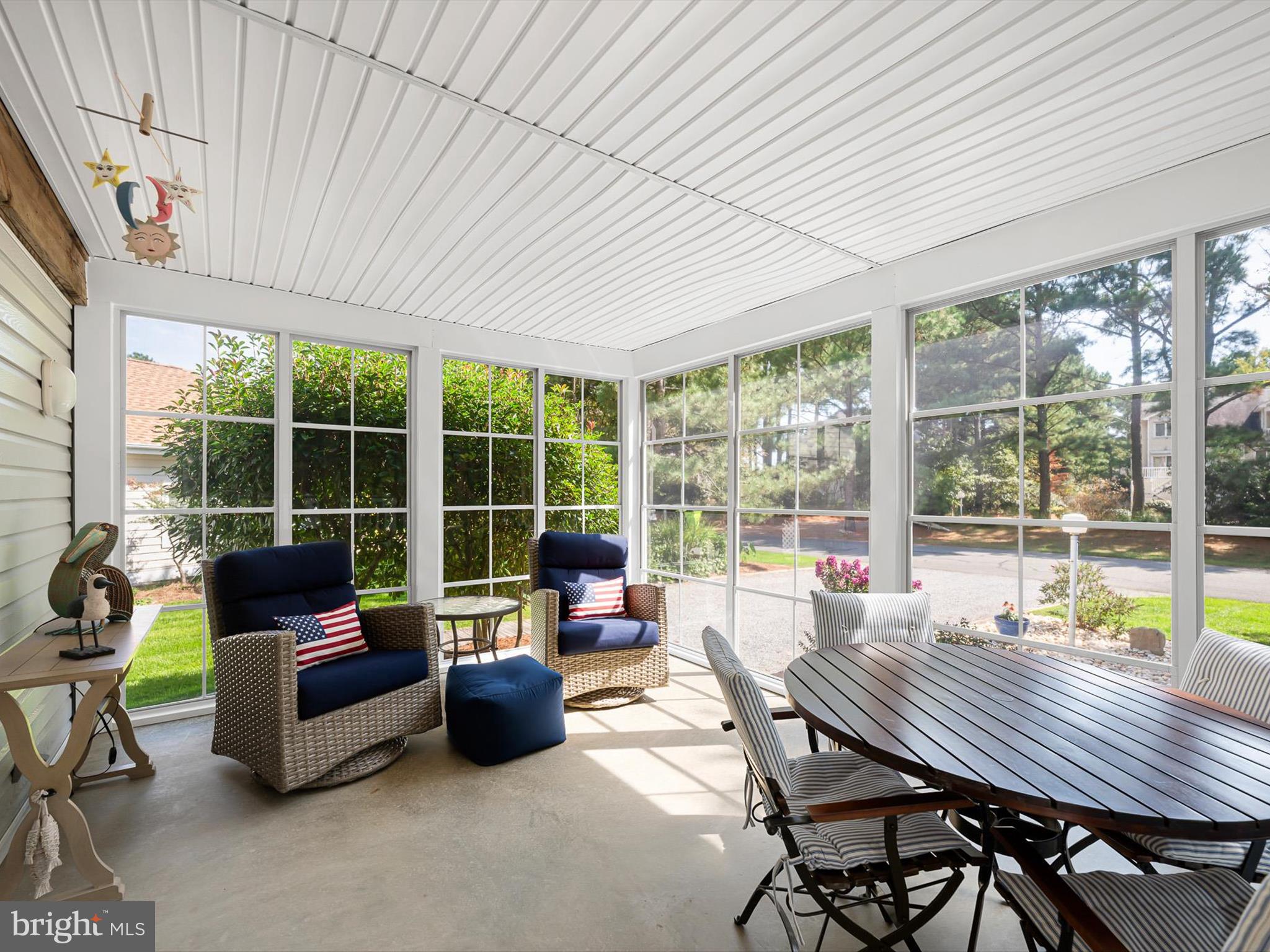532 Bethany Loop Bethany Beach, DE 19930 - Photo 22 of 65 a living room with furniture and a large window