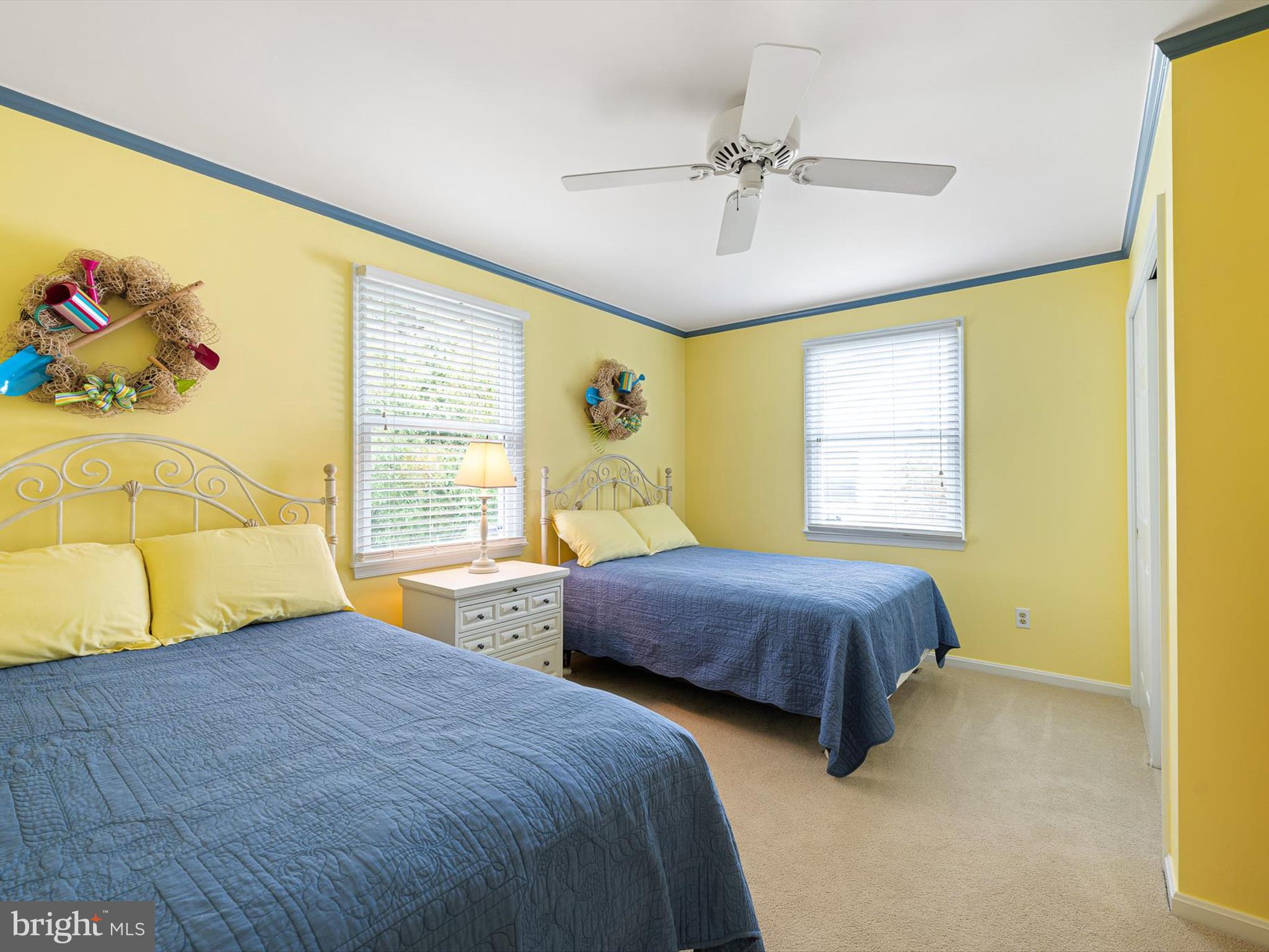 532 Bethany Loop Bethany Beach, DE 19930 - Photo 24 of 65 a bedroom with two beds and a window
