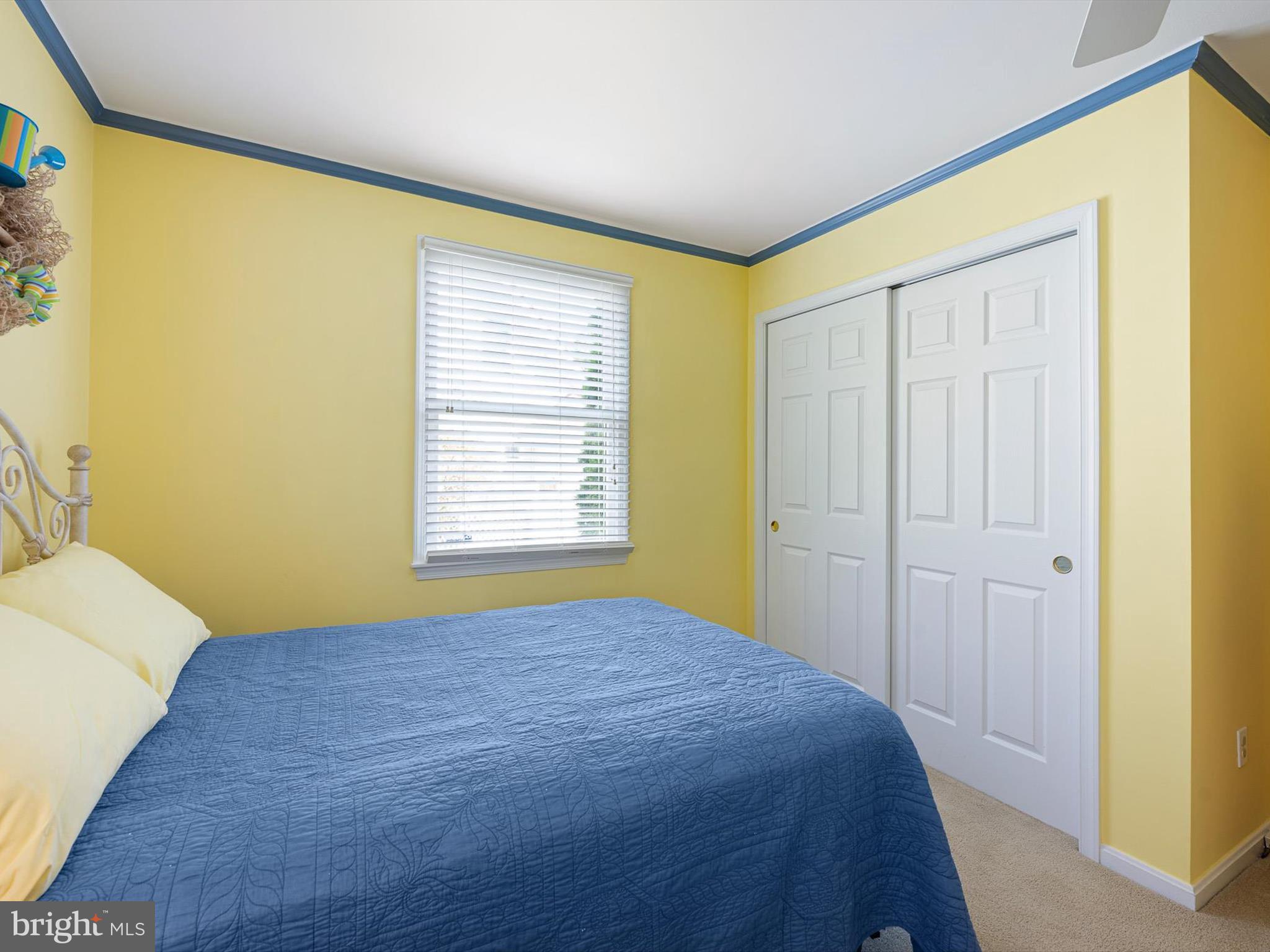 532 Bethany Loop Bethany Beach, DE 19930 - Photo 26 of 65 a bedroom with a bed and a window