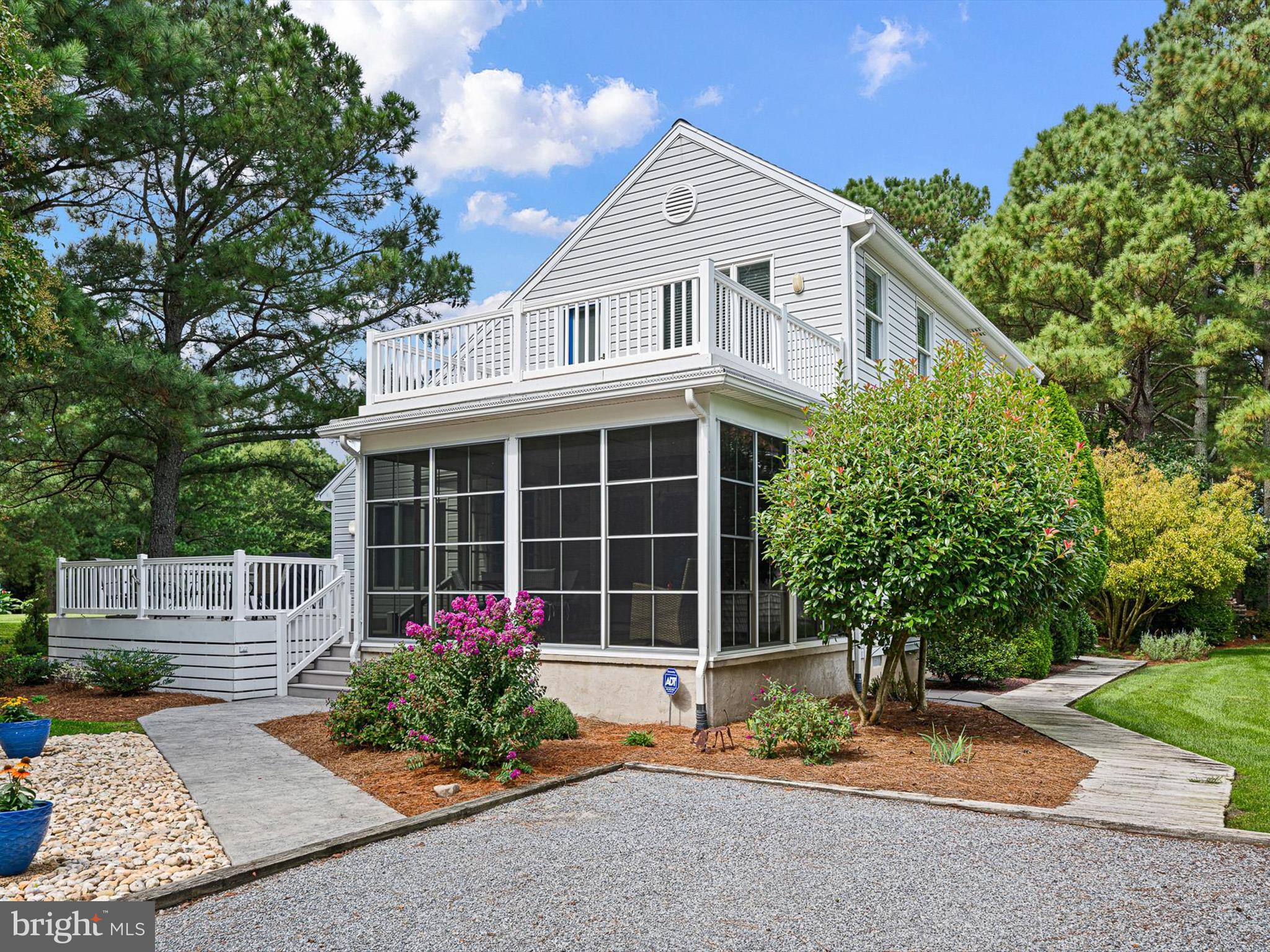 532 Bethany Loop Bethany Beach, DE 19930 - Photo 3 of 65 a front view of a house with a yard