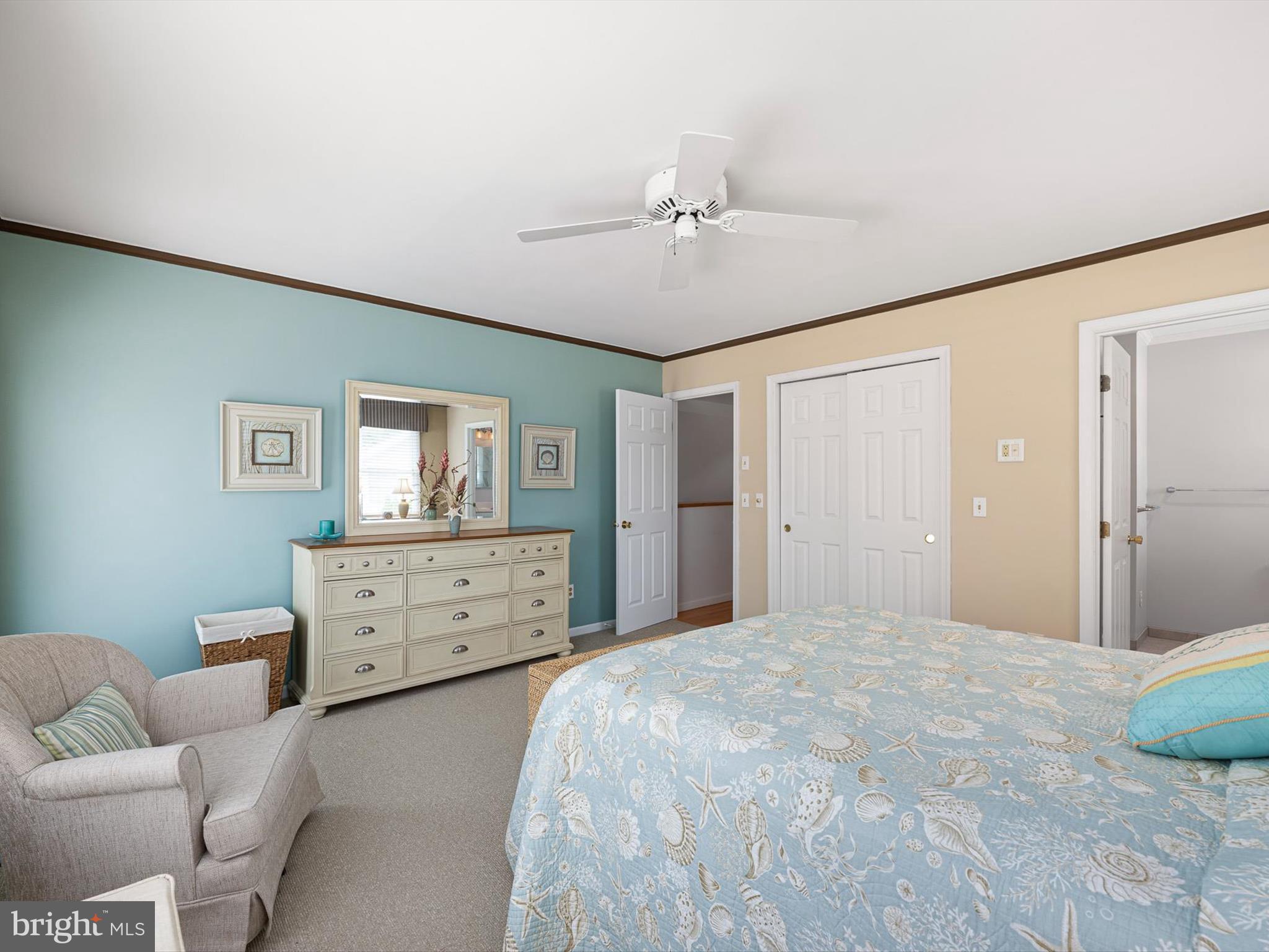 532 Bethany Loop Bethany Beach, DE 19930 - Photo 35 of 65 a bedroom with a bed and ceiling fan