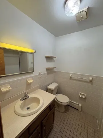 a bathroom with a sink and a toilet