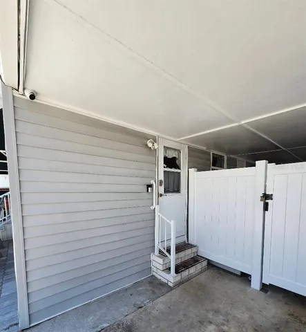 a view of a room with wooden walls