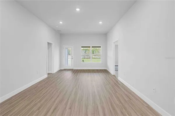 a view of livingroom with wooden floor