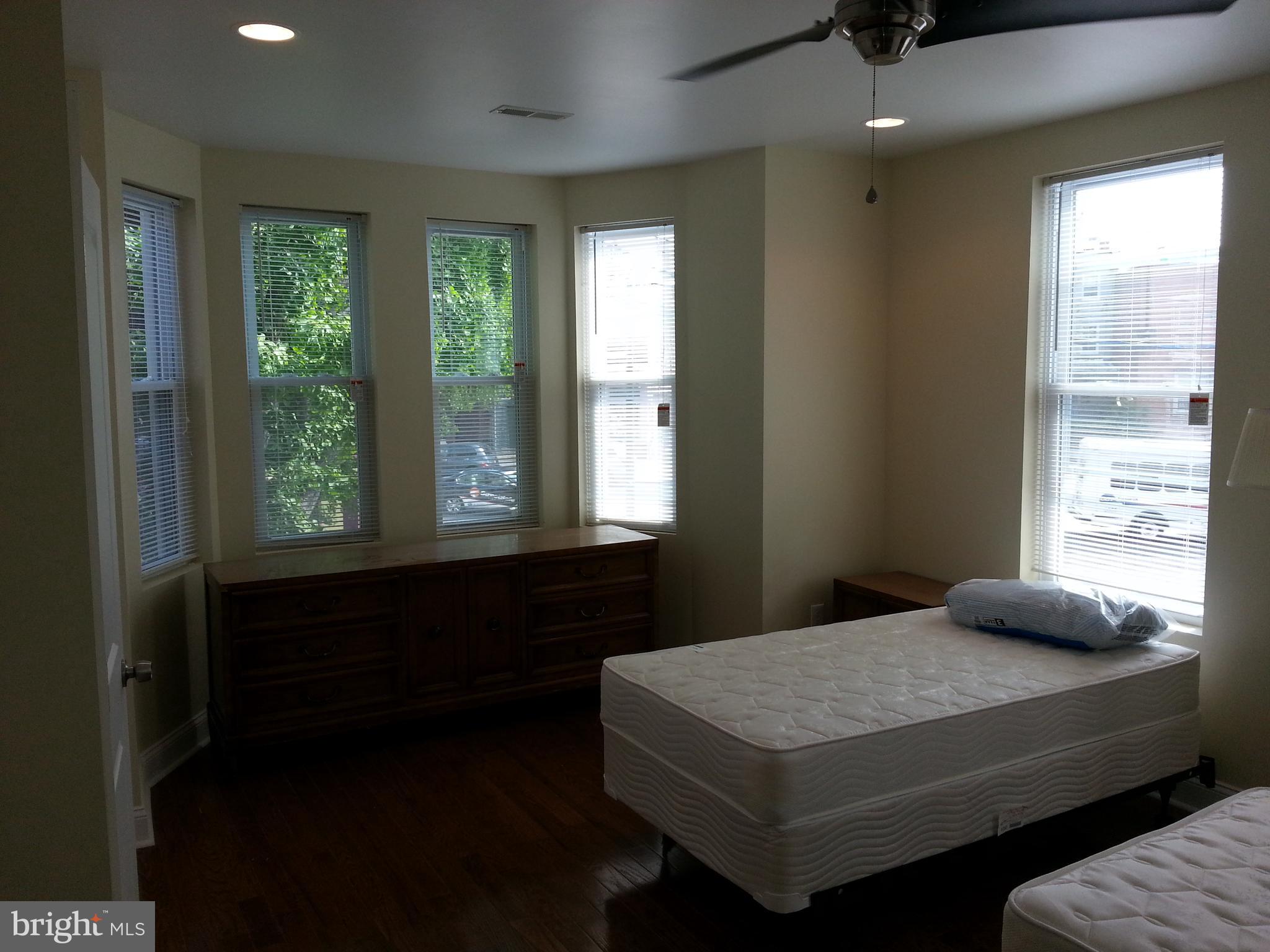 500 North 39th Street Philadelphia, PA 19104 - Photo 7 of 26 a bedroom with a bed and window