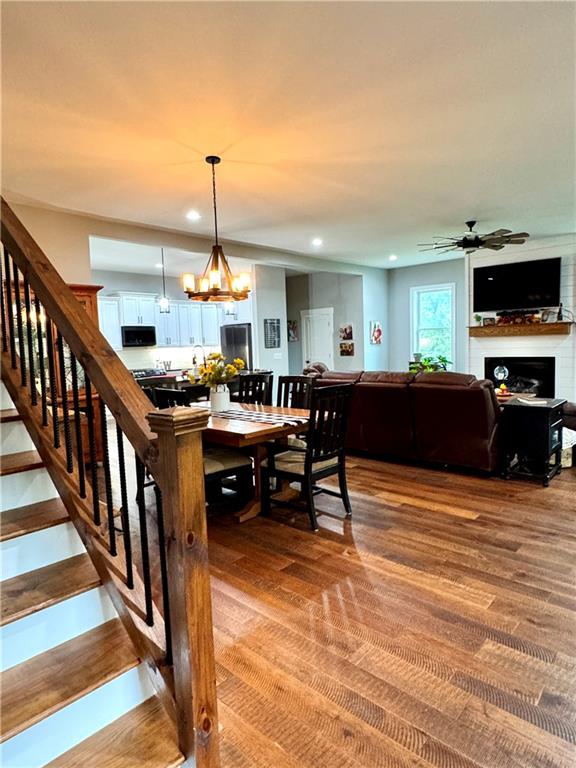 250 Hook Road Northeast Ranger, GA 30734 - Photo 41 of 114 a living room with furniture flat screen tv and a fireplace