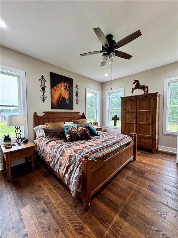 250 Hook Road Northeast Ranger, GA 30734 - Photo 50 of 114 a bedroom with a bed and a chandelier