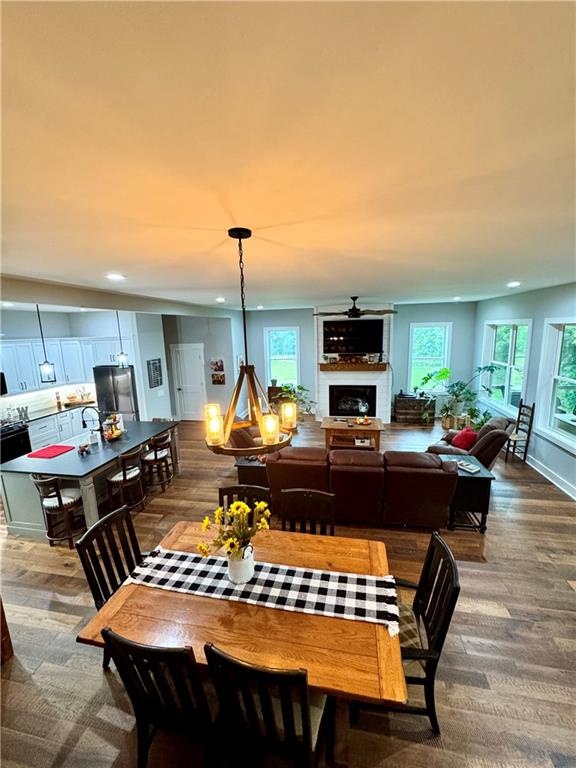 250 Hook Road Northeast Ranger, GA 30734 - Photo 56 of 114 a living room with furniture a rug and a fireplace