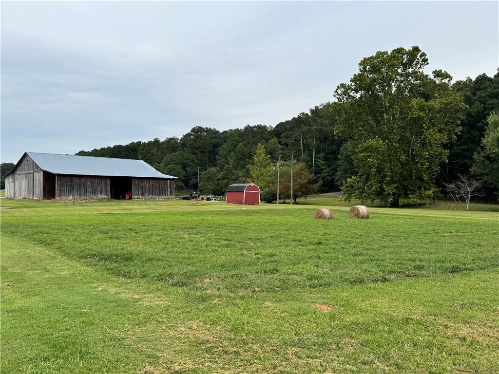 250 Hook Road Northeast Ranger, GA 30734 - Photo 82 of 114 a view of green field with house in the background