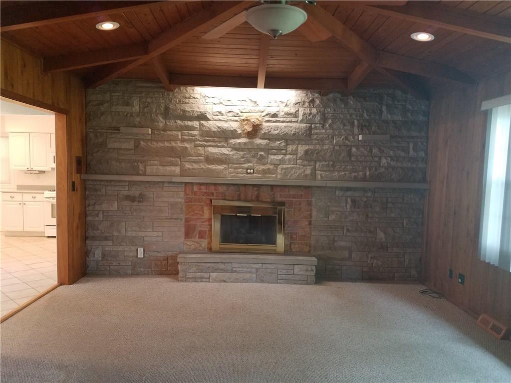 3306 Morefield Road Hermitage, PA 16148 - Photo 5 of 14 Living room with Gas fireplace, wormy chestnut walls and ceiling - new recessed lighting