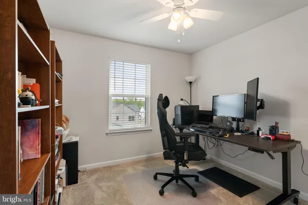 a view of room with cabinet and closet