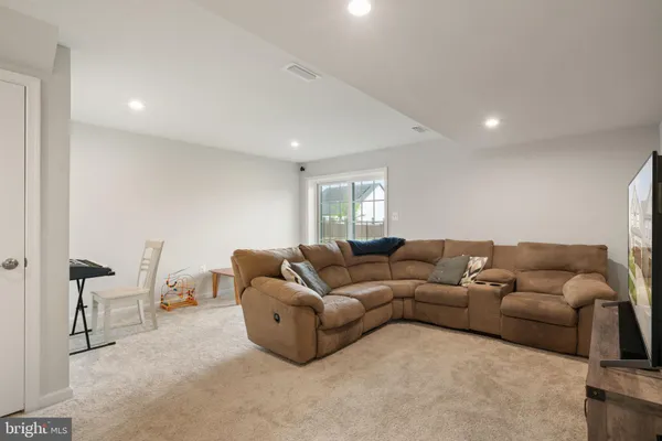 a livingroom with furniture and furniture