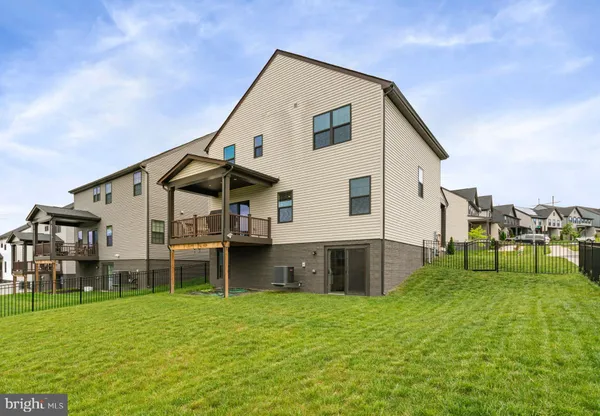 a bathroom with a shower and a toilet