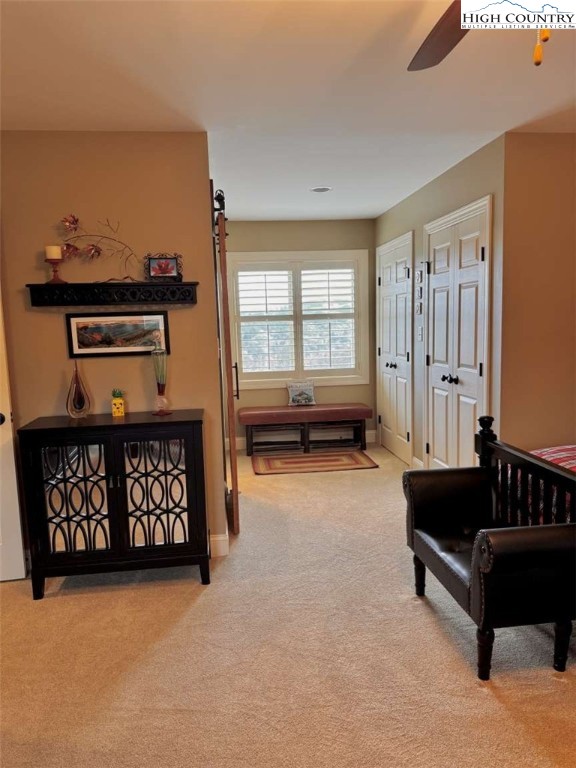 167 Elliott Circle, Unit D1 Blowing Rock, NC 28605 - Photo 18 of 25 a bedroom with furniture and a window