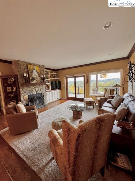 167 Elliott Circle, Unit D1 Blowing Rock, NC 28605 - Photo 3 of 25 a living room with furniture and a large window