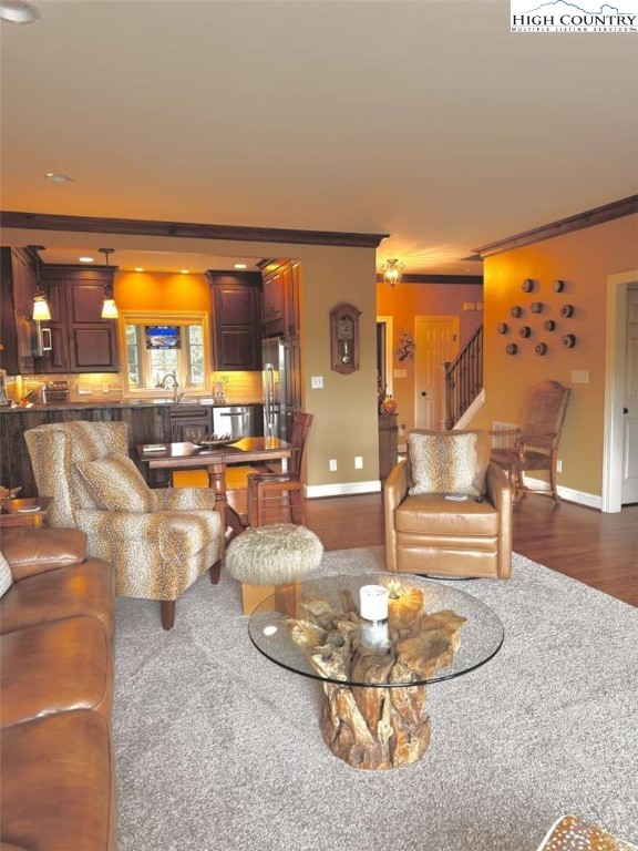 167 Elliott Circle, Unit D1 Blowing Rock, NC 28605 - Photo 4 of 25 a living room with furniture and a large window