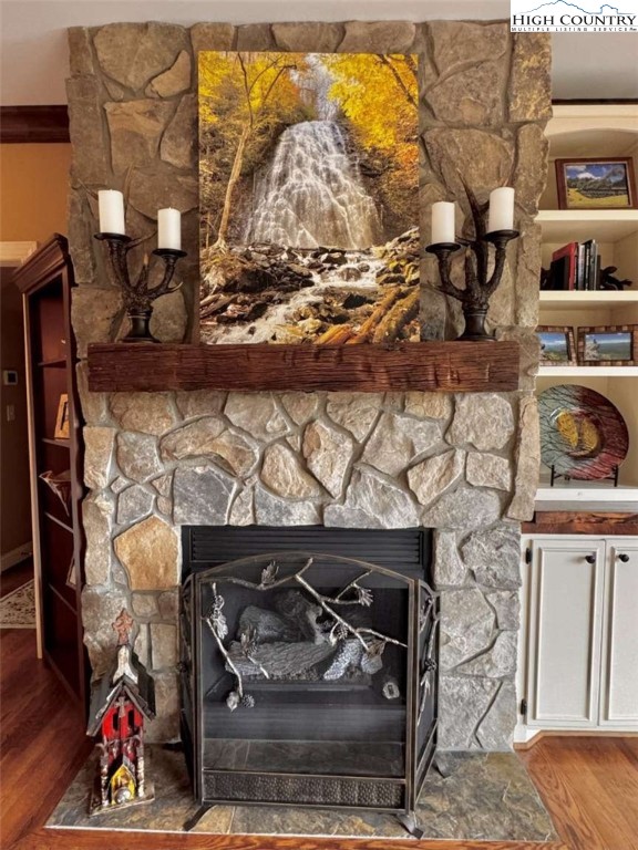 167 Elliott Circle, Unit D1 Blowing Rock, NC 28605 - Photo 5 of 25 a view of fireplace and wooden floor