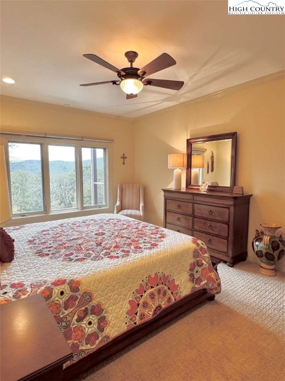 167 Elliott Circle, Unit D1 Blowing Rock, NC 28605 - Photo 9 of 25 a bedroom with a bed and window