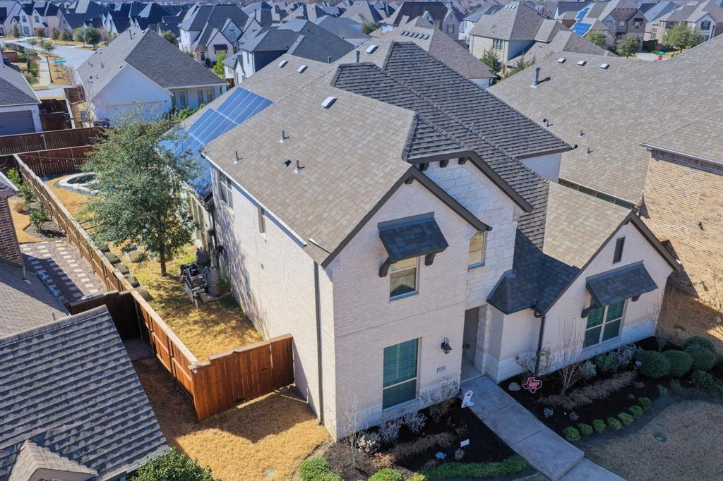 15193 Basket Oak Road Frisco, TX 75035 - Photo 2 of 40 an aerial view of a house with a yard