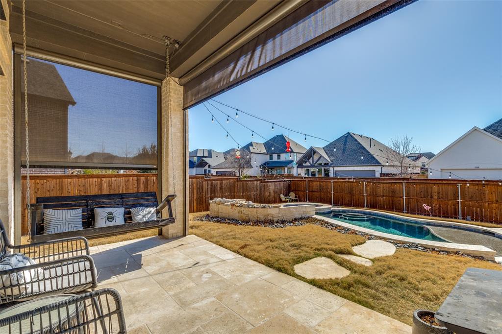 15193 Basket Oak Road Frisco, TX 75035 - Photo 25 of 40 Fenced backyard with a patio area and a residential view