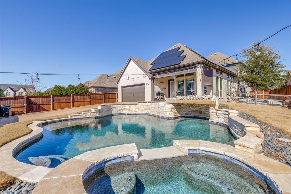 15193 Basket Oak Road Frisco, TX 75035 - Photo 26 of 40 Combined pool / hot tub with a patio area and a fenced backyard