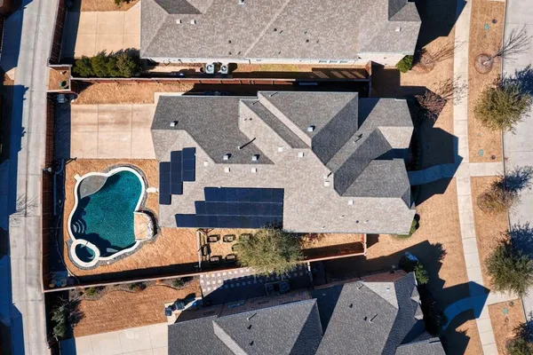 an aerial view of houses with deck
