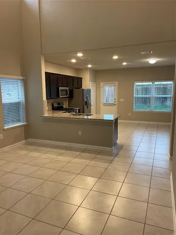 a view of kitchen and window