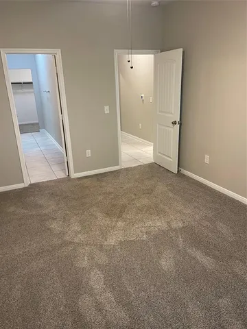 an empty room with mirror