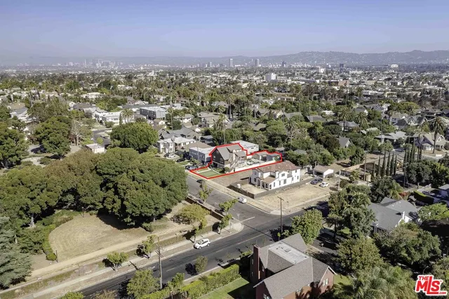 an aerial view of a city with lots of residential buildings