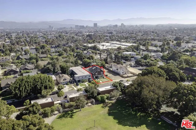 an aerial view of a city with lots of residential buildings