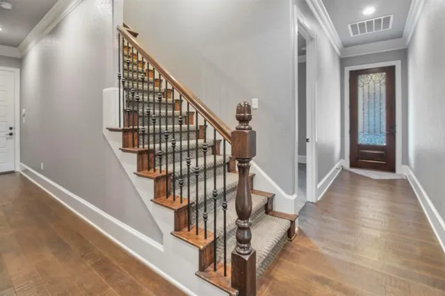 a view of entryway with wooden floor