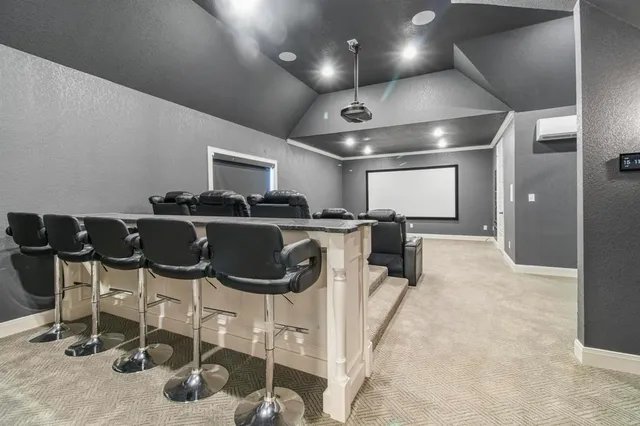 a kitchen with a table and chairs