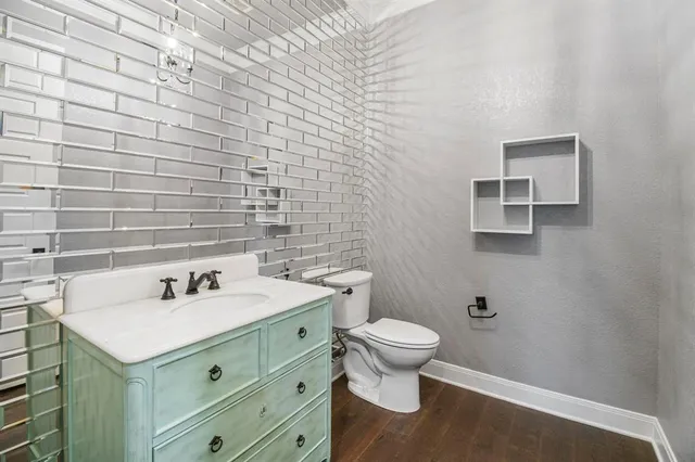 a bathroom with a sink and a toilet