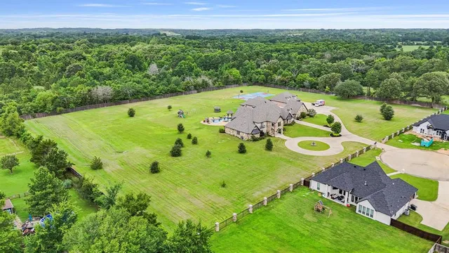 an aerial view of a pool