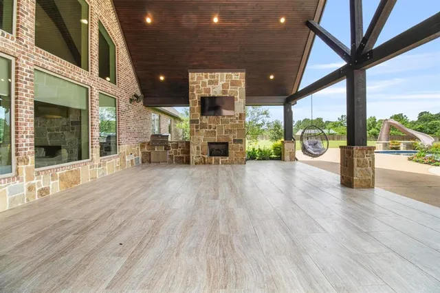 a lobby with furniture and floor to ceiling window