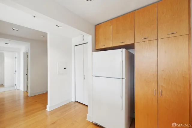 a view of a bathroom with a shower and a sink