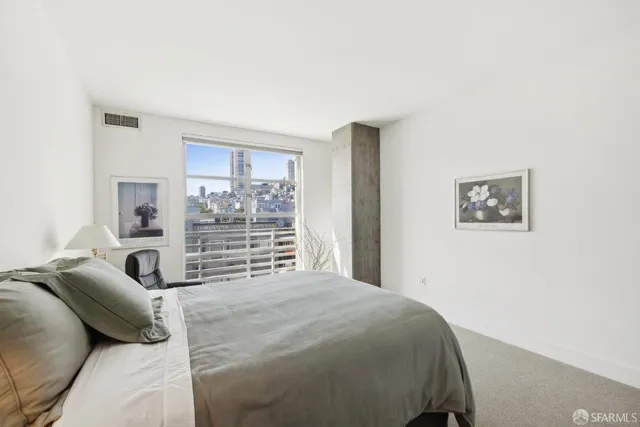 a view of a city with tall buildings