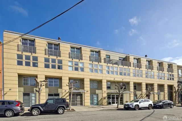 a view of a building with a yard