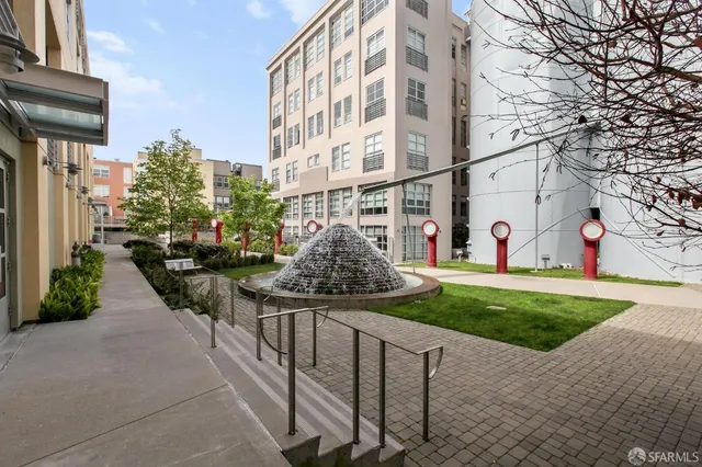 a view of a pathway of a building in front of house