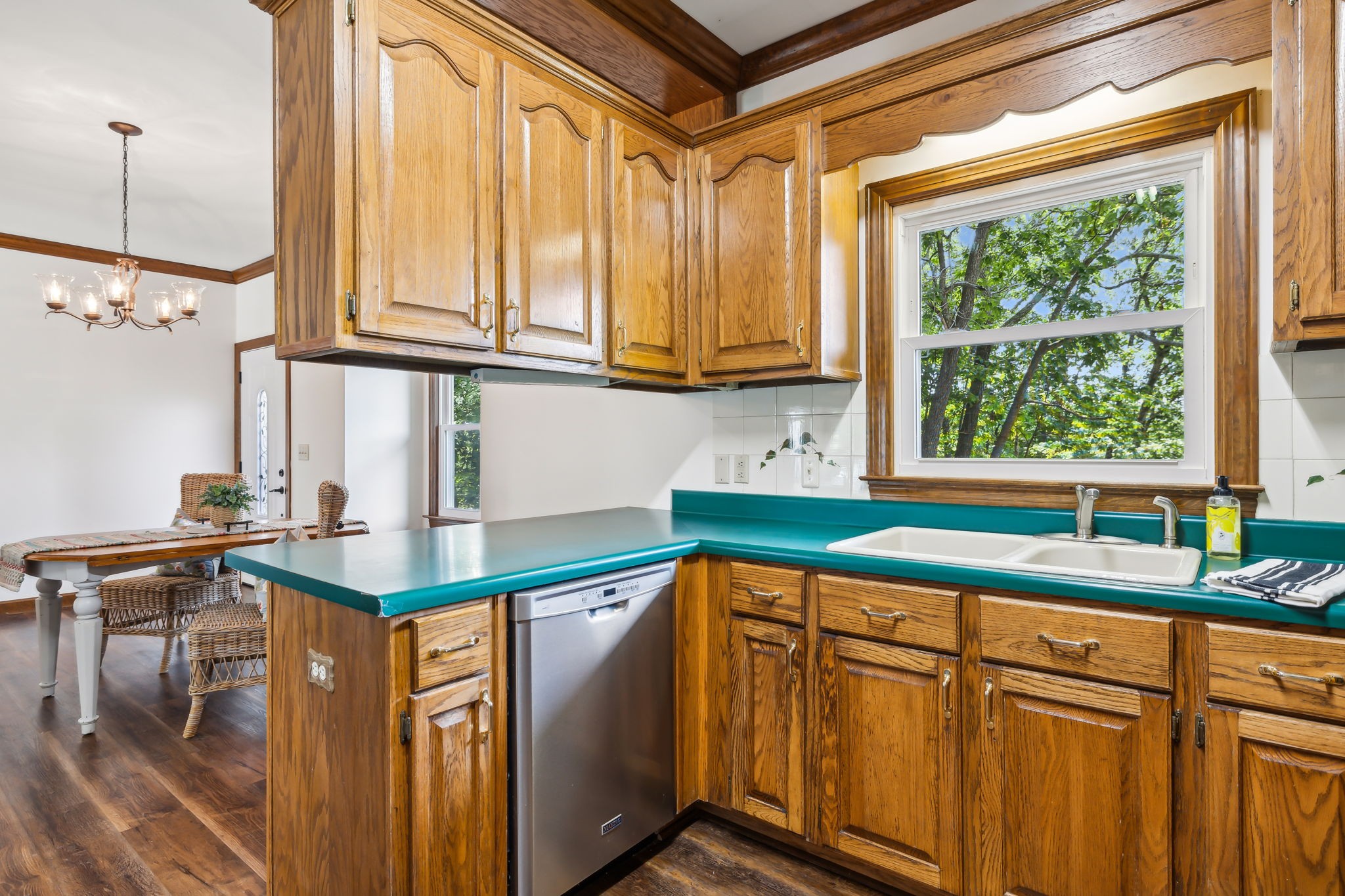 1712 Sugar Ridge Road Spring Hill, TN 37174 - Photo 22 of 65 a kitchen with stainless steel appliances a sink and a window
