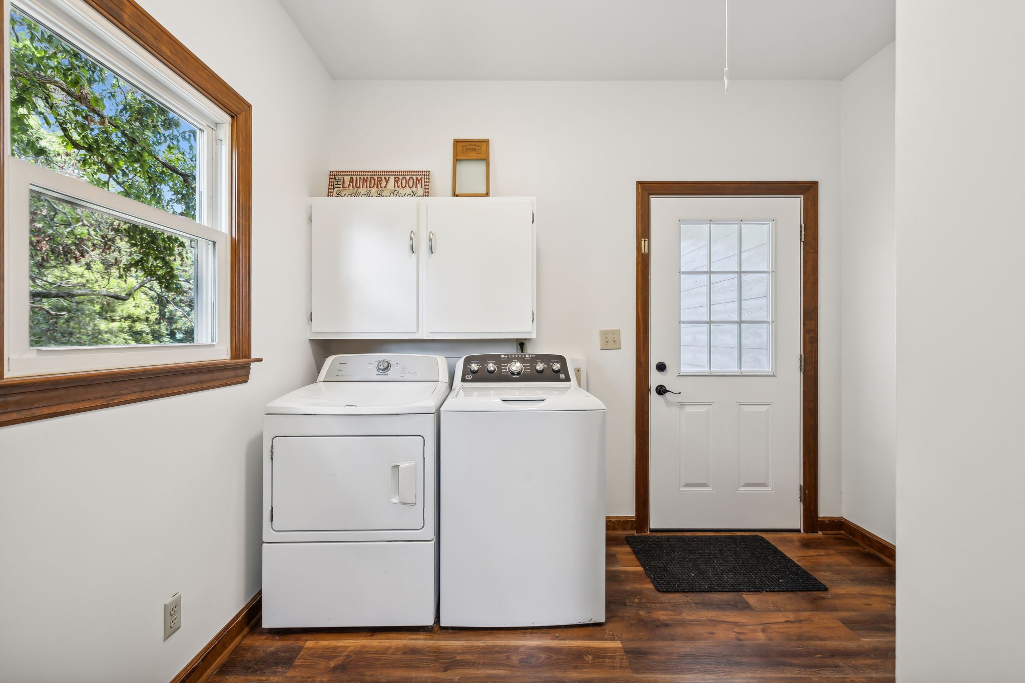 1712 Sugar Ridge Road Spring Hill, TN 37174 - Photo 24 of 65 a view of washer and dryer with bathroom in the background