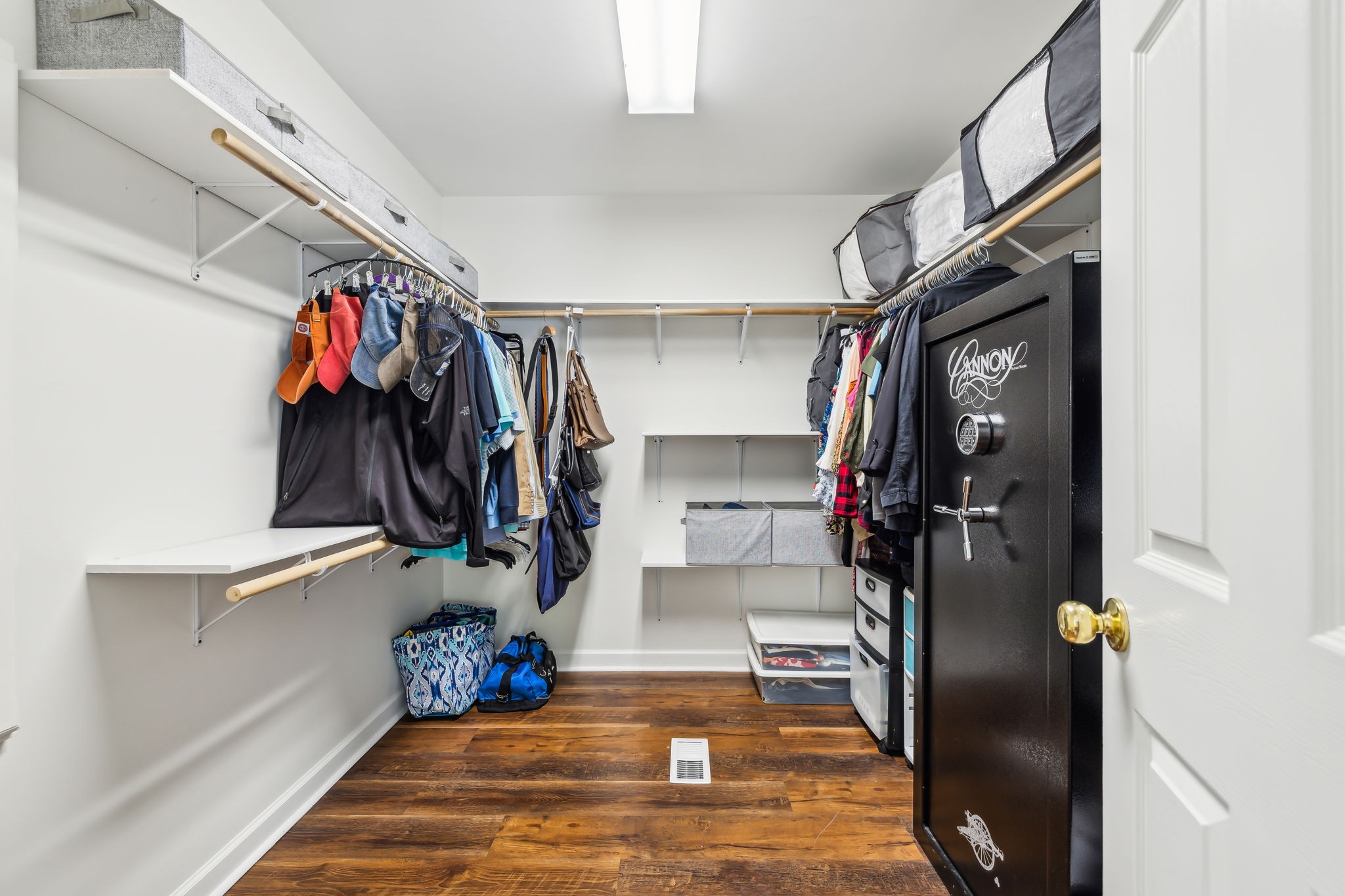 1712 Sugar Ridge Road Spring Hill, TN 37174 - Photo 33 of 65 a view of walk in closet with clothes and shoes